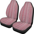 Cow spot leopard print retro pattern on a pair of universal fit polyester car seat covers.