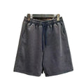 Men's straight-leg cotton casual shorts in distressed navy blue colour showing loose fit and fifth-pants length