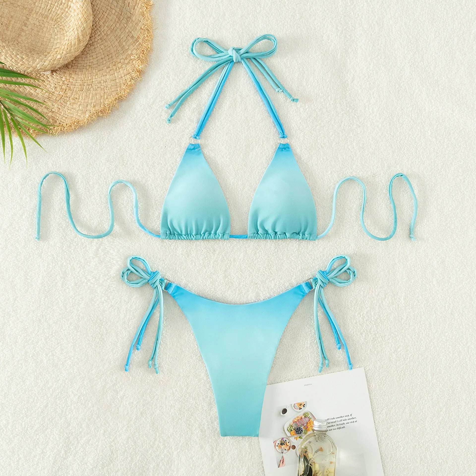 Women's separate bikini swimwear in a gradient colour with a bikini top and briefs bottom.