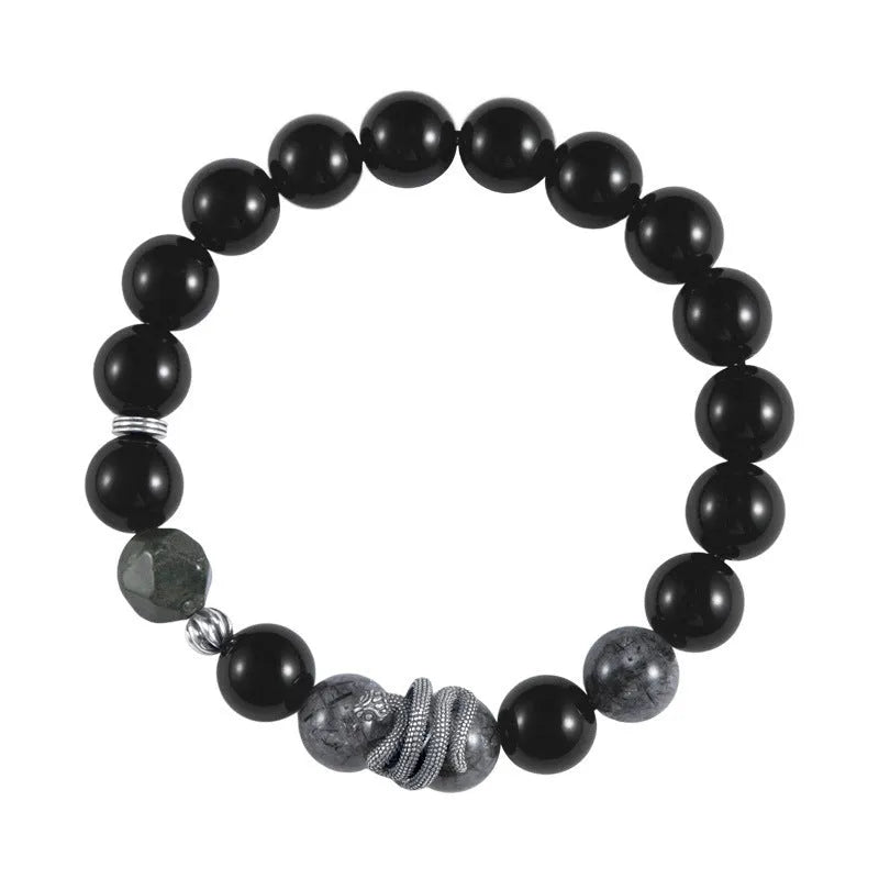 Men's S925 sterling silver bracelet with a black obsidian snake charm on a dark background.