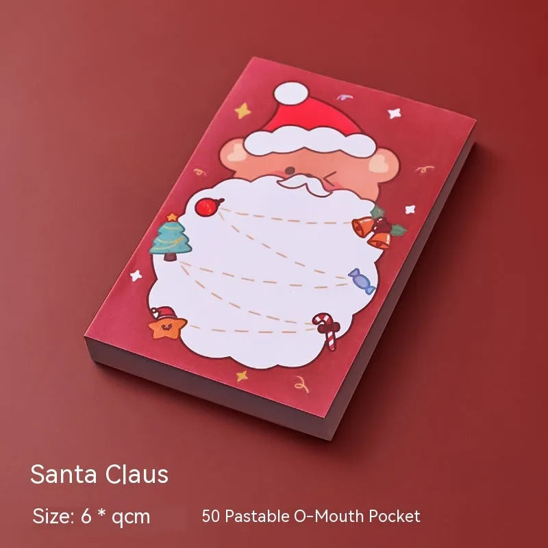 Christmas sticky notes pad showing eight festive designs including Santa Claus, elf, snowman, and gift box