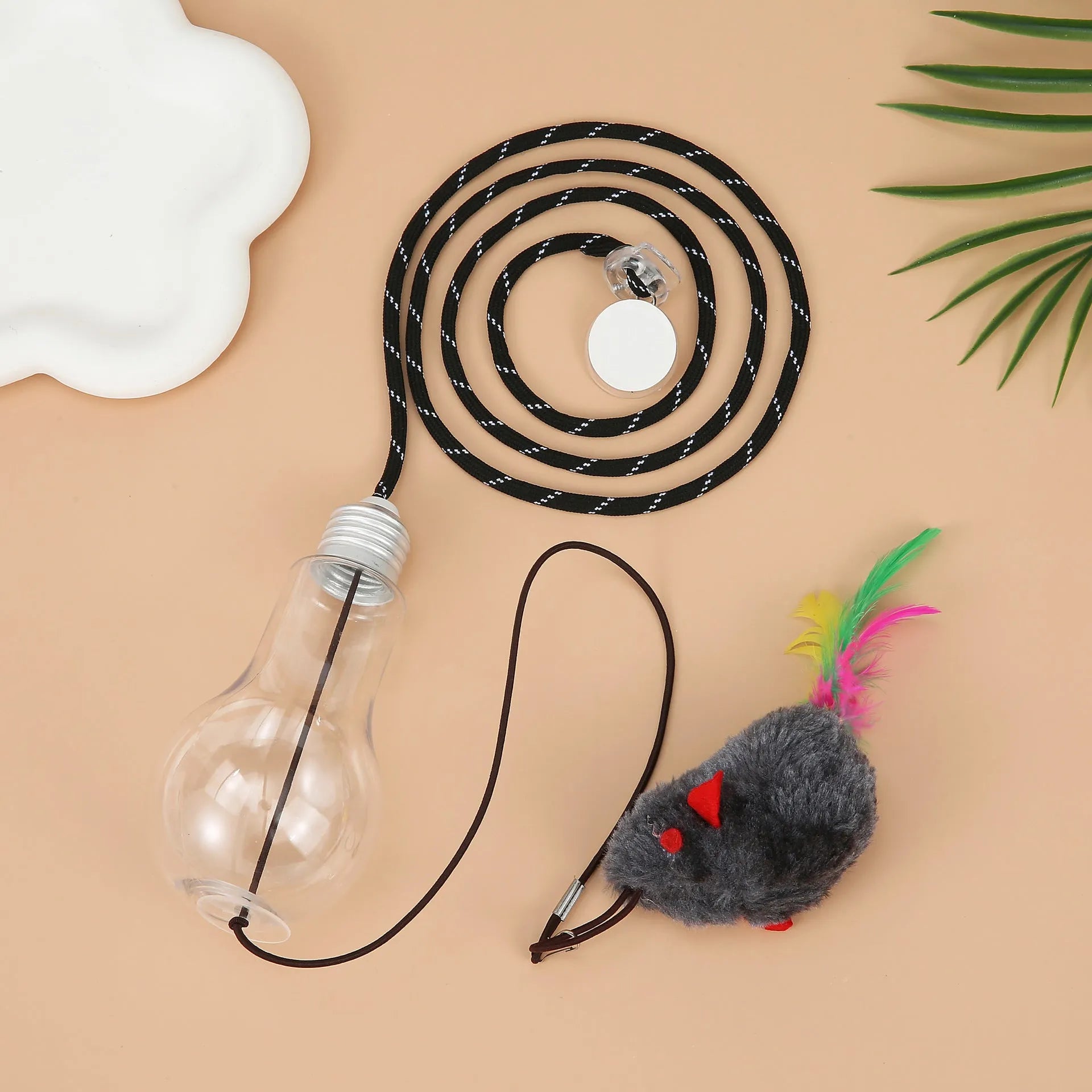 Grey and yellow hanging cat toy with elastic rope, dangling mouse attachment, and treat dispenser bulb