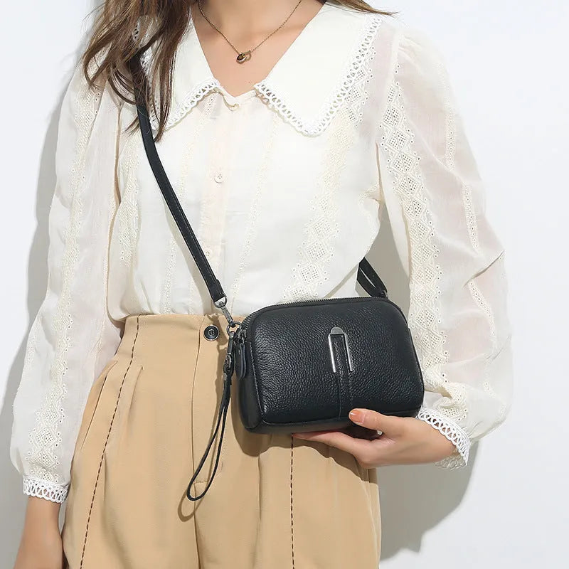 Women's genuine leather square shoulder bag in dark khaki colour, showing structured horizontal shape.