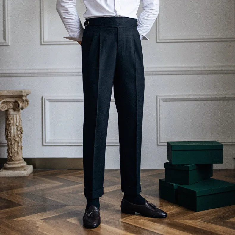 Man wearing black high-waisted straight-leg casual polyester trousers.