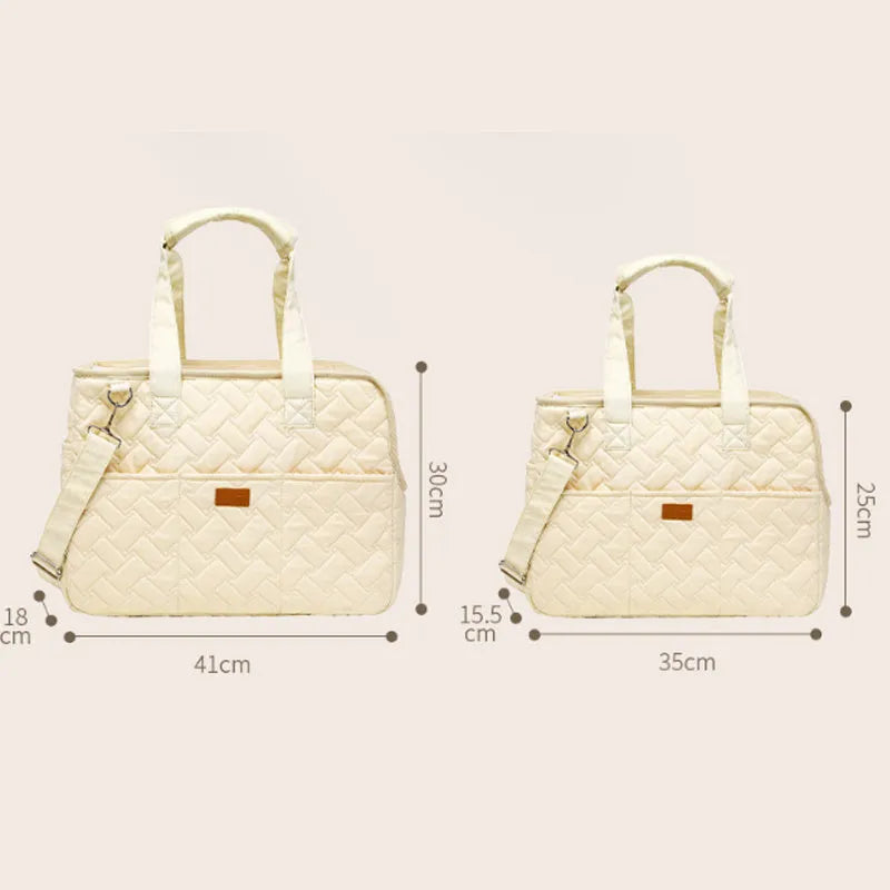 Grey pet carrier handbag with mesh panels and multiple pockets for small dog or cat transport
