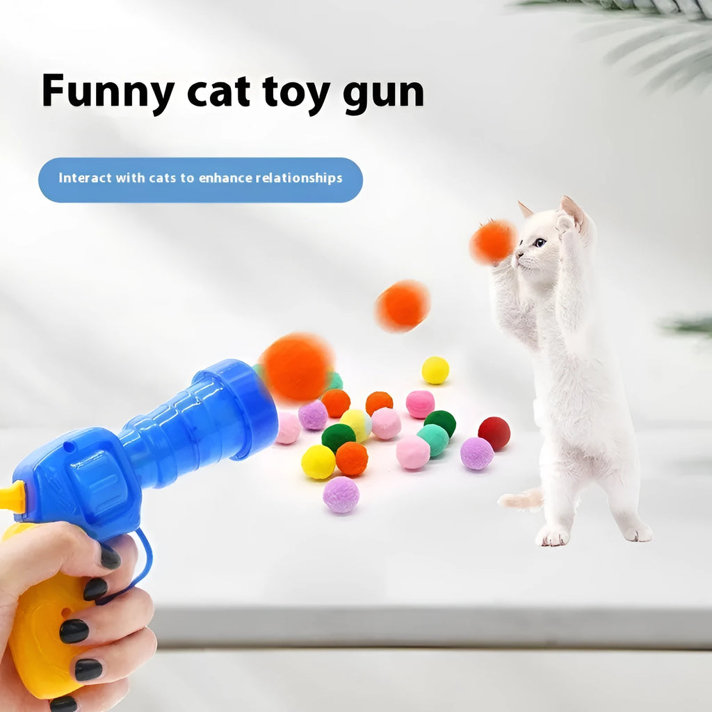 Plush cat toy launch gun with soft yarn balls for interactive indoor pet play.