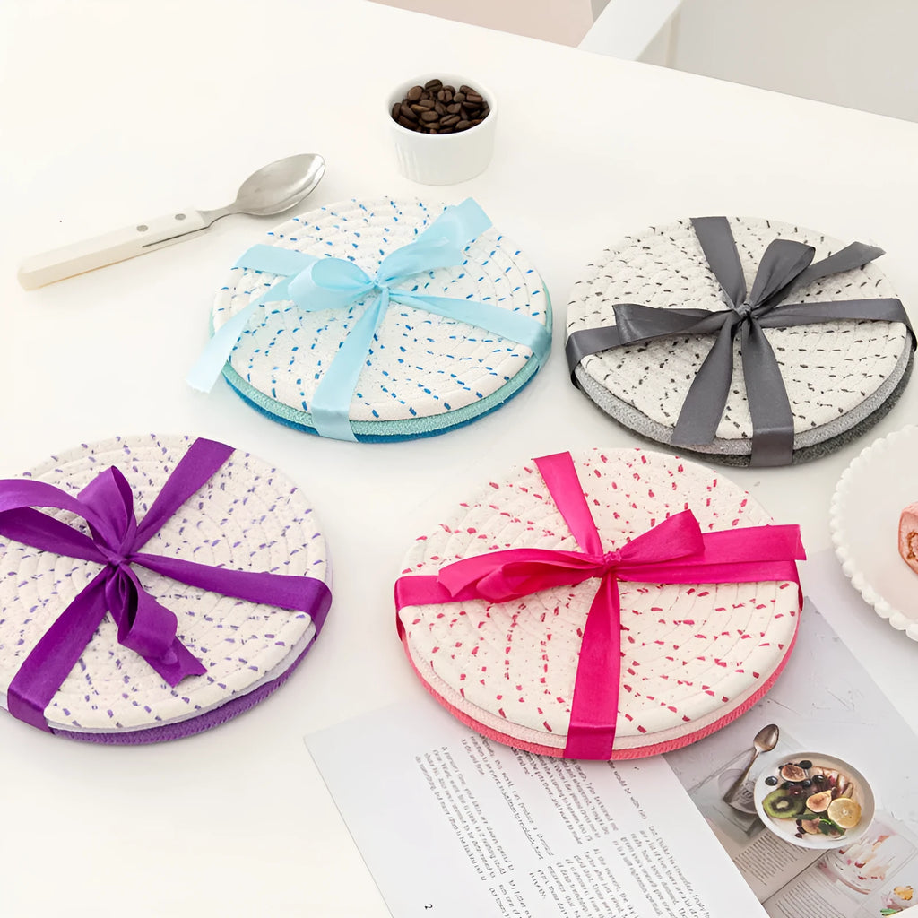 Cotton cord round coaster set showing three 18cm diameter placemats in modern colour options