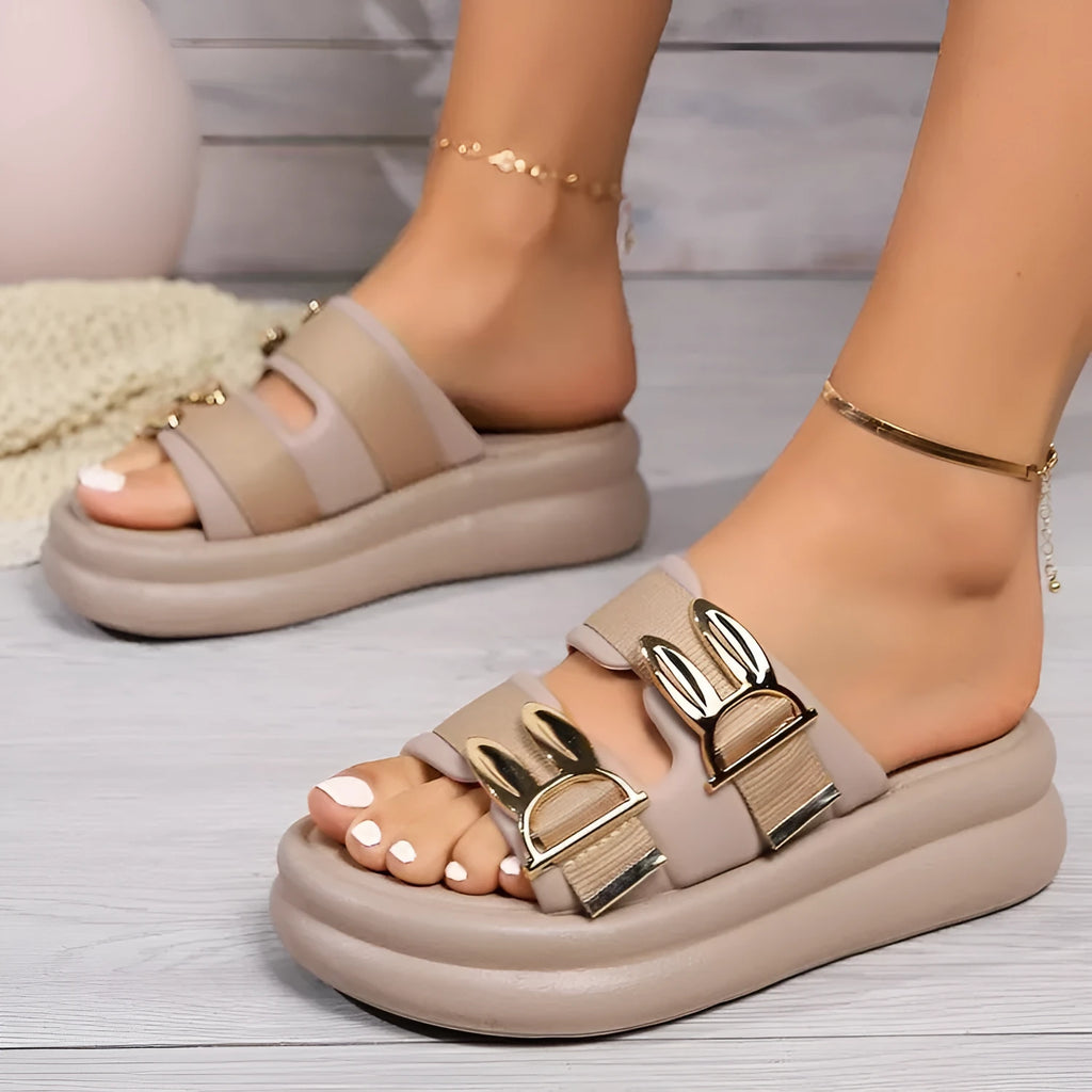 Women's thick bottom slippers with suede upper and rubber sole in apricot, black, and off-white colours