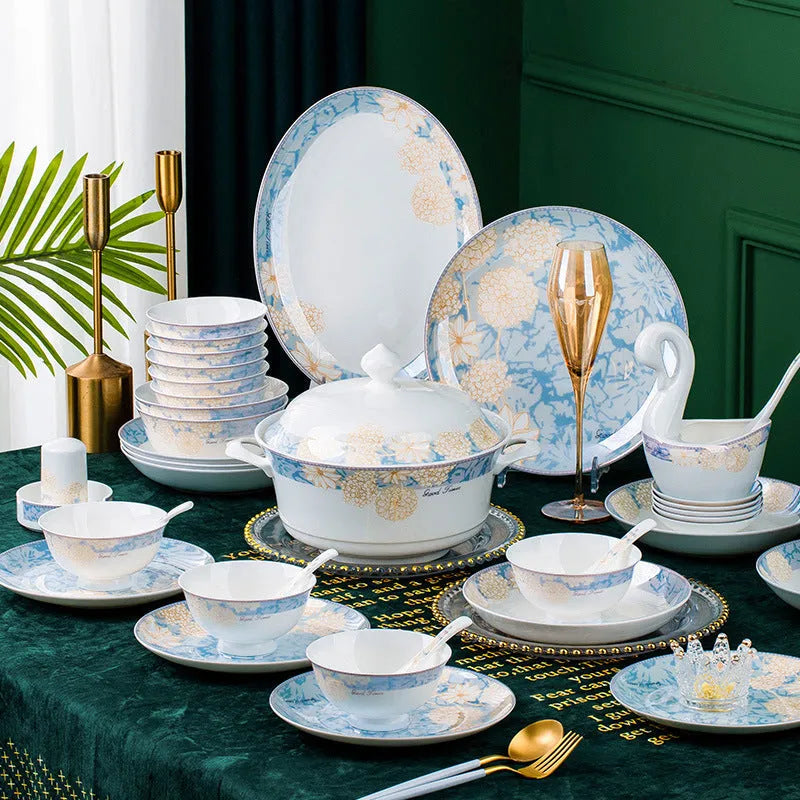 16 piece new bone china dinner set with bowls plates spoons and chopsticks on a table