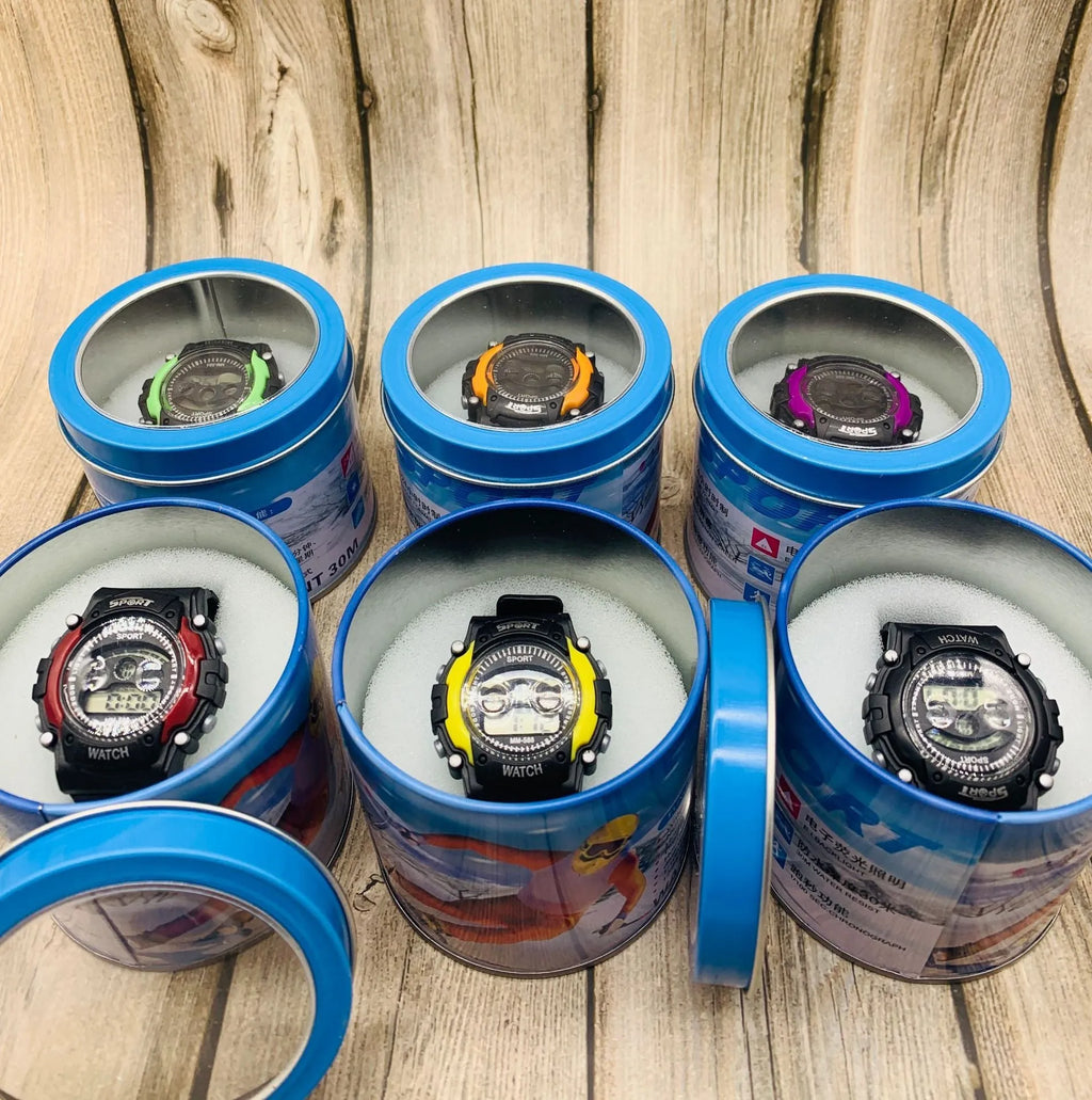 Children's digital sports watch with silicone strap and large face in mixed colours showing alarm and calendar functions