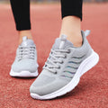 Women's mesh surface running shoes low top flat heel rubber sole front lace-up