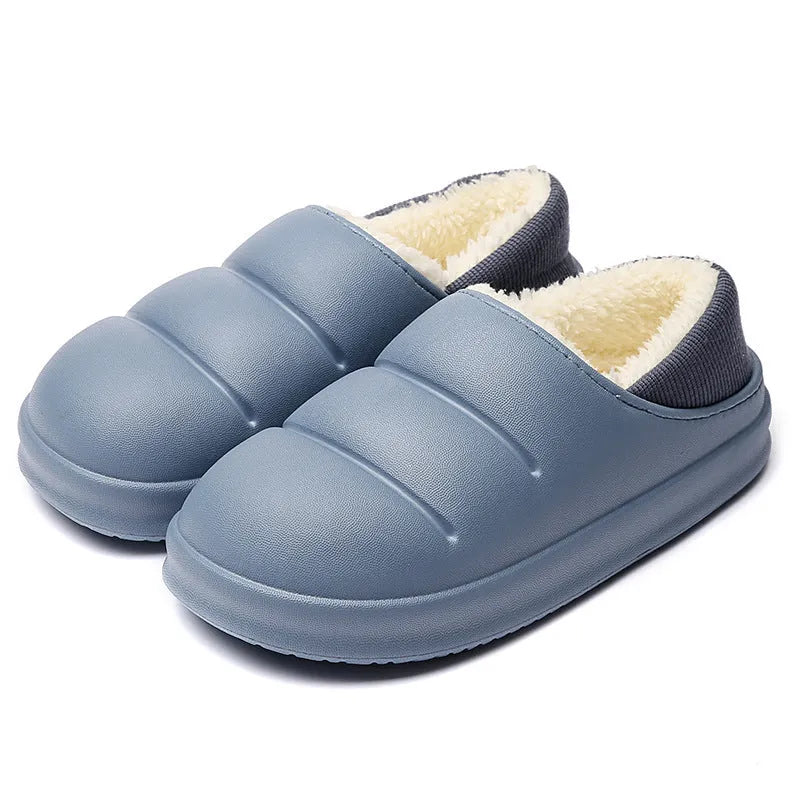 Yellow and green waterproof EVA winter house slippers with plush lining and non-slip sole.