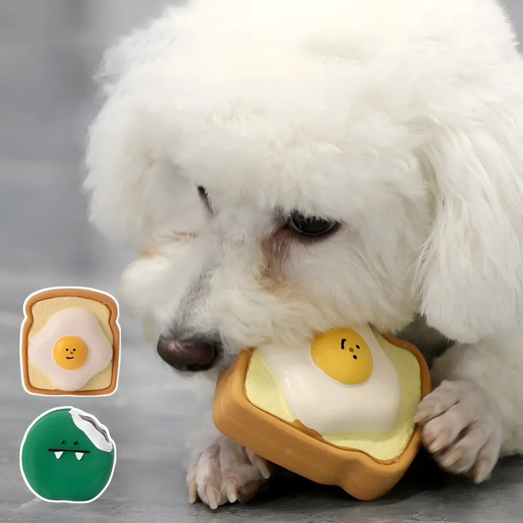 Yellow and green bread-shaped latex dog chew toy with squeaker.