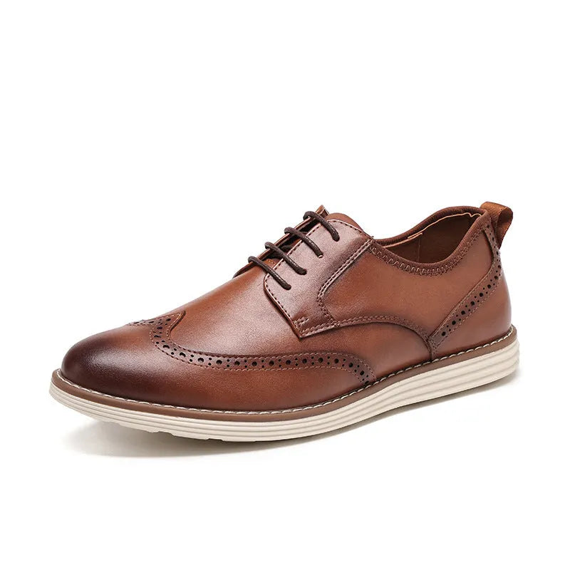 Men's black slip-on casual shoe with round toe and carved detail on the PU upper.