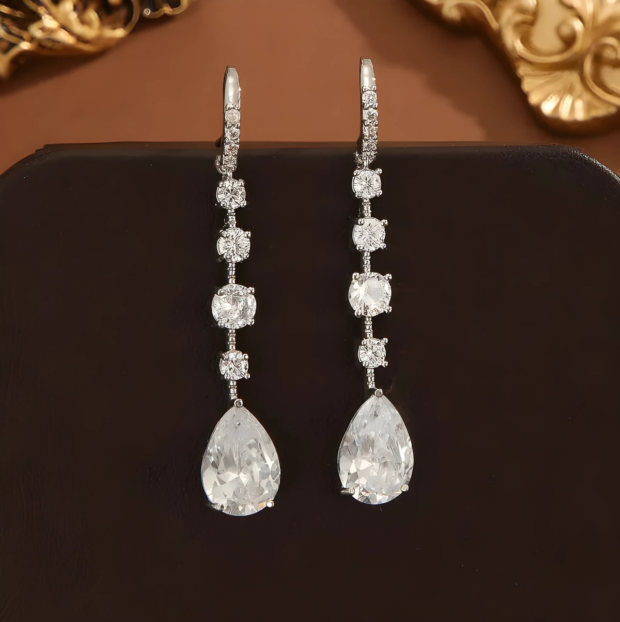 Women's copper electroplated teardrop drop high-carbon earrings in silver white zircon finish