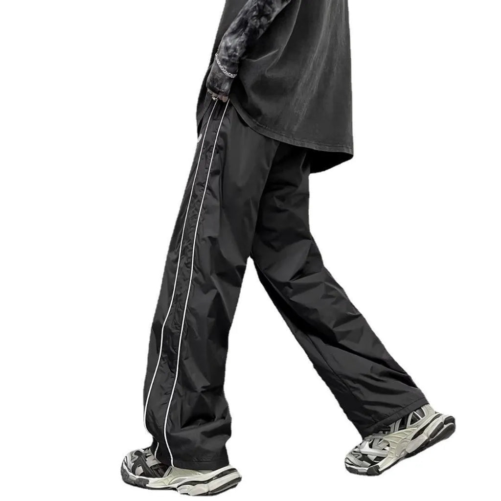 Men's navy blue wide leg striped casual pants made from lightweight polyester fabric, suitable for summer