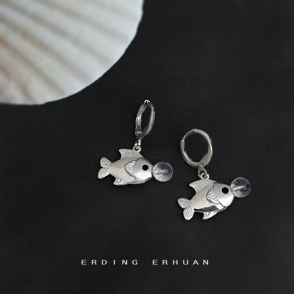 A pair of goldfish-design bubble fish earrings made from electroplated copper.