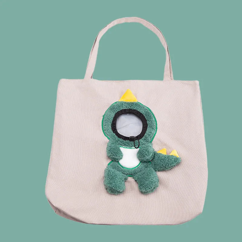 Little Bee Design canvas pet carrier shoulder bag with safety zippers and an adjustable elastic head opening for a cat or small dog.