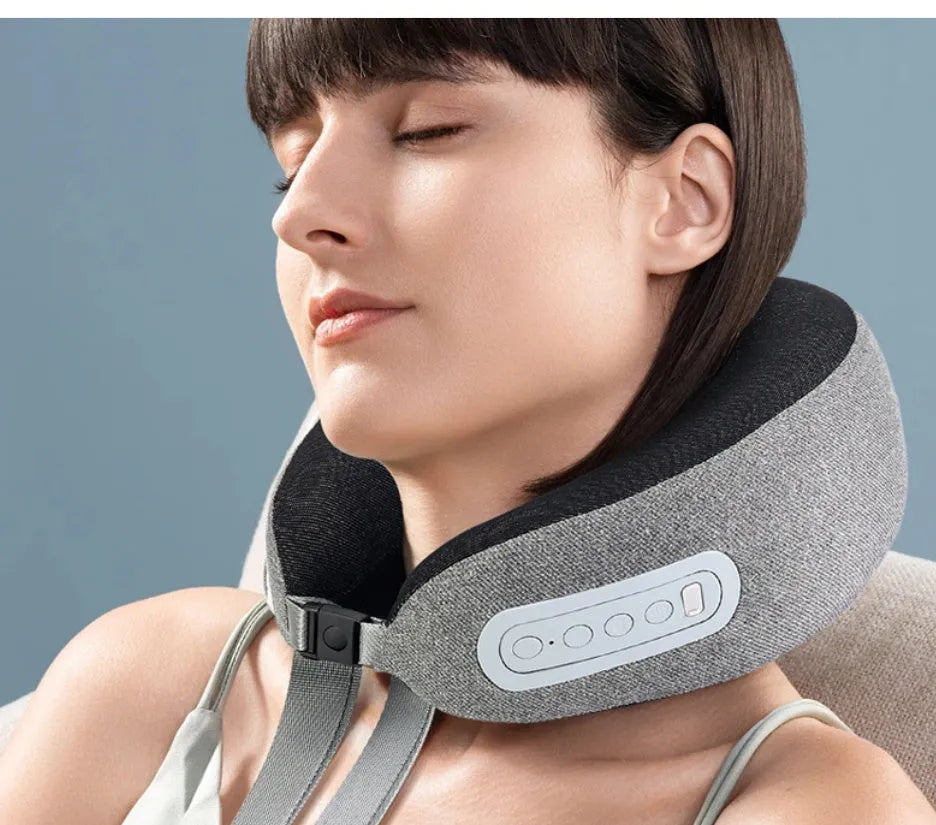 Light gray U-shaped memory foam massage pillow with USB cable for home use
