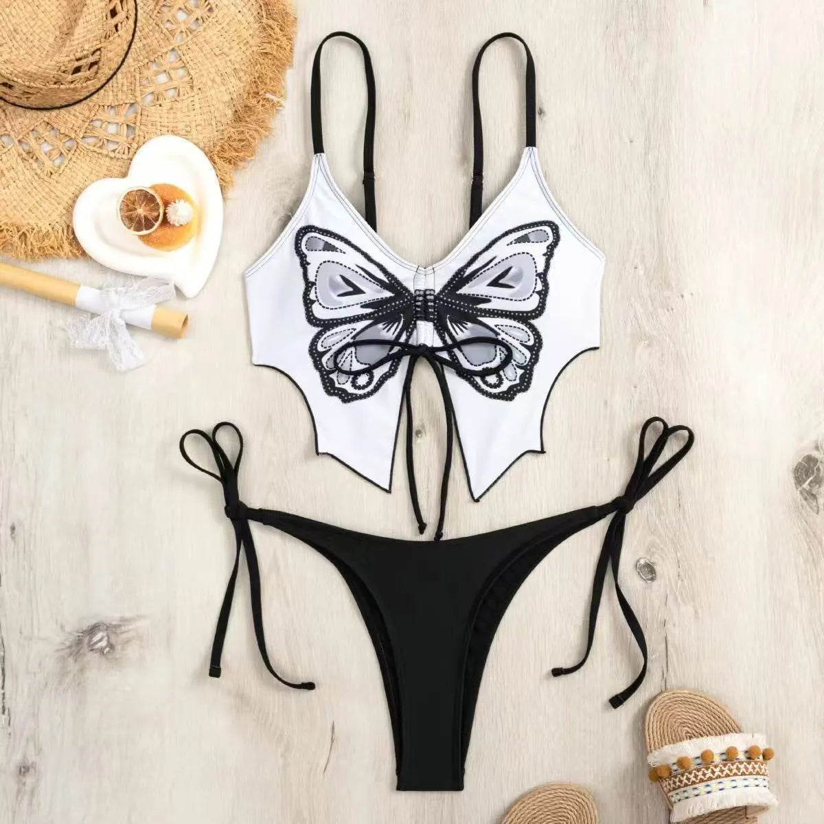 Women's sleeveless split bikini set with bow detail in multiple colour options