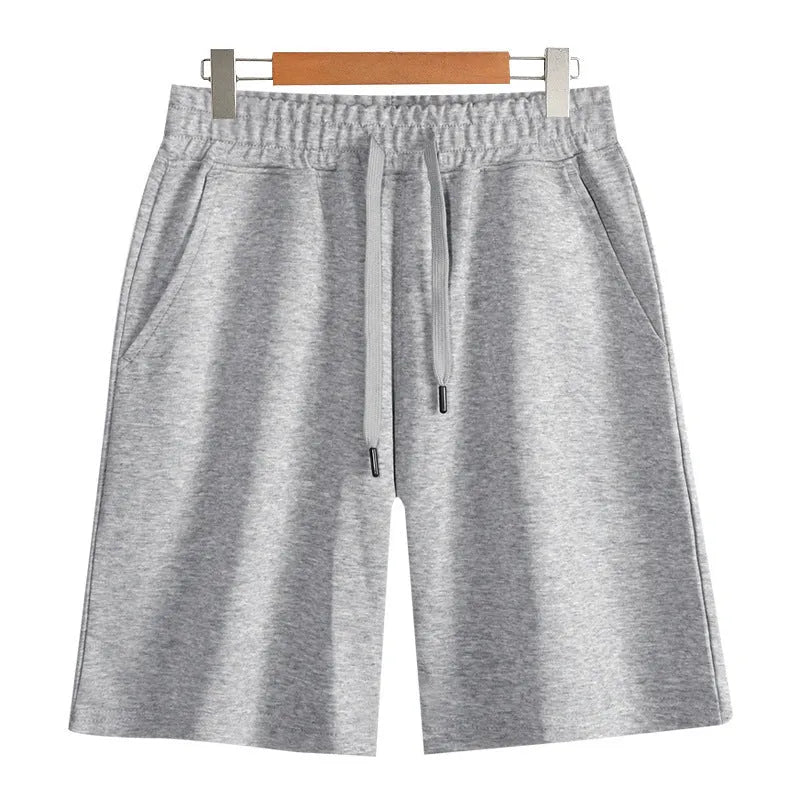 Cotton straight-leg summer shorts in light grey shown on a hanger