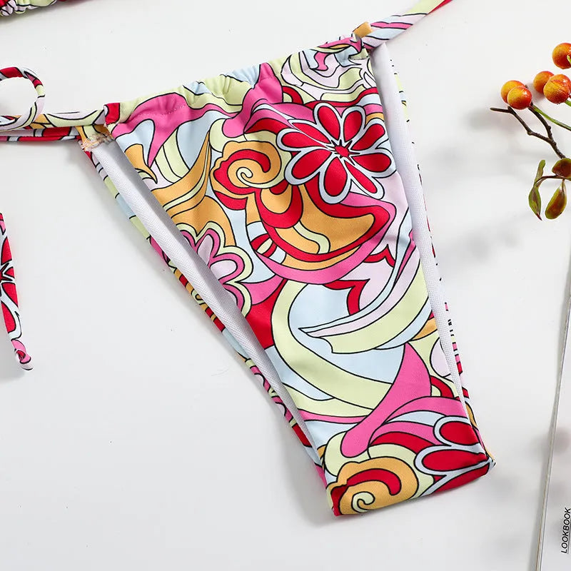 Women's triangle bikini swimsuit with hanging neck design and multicolour print