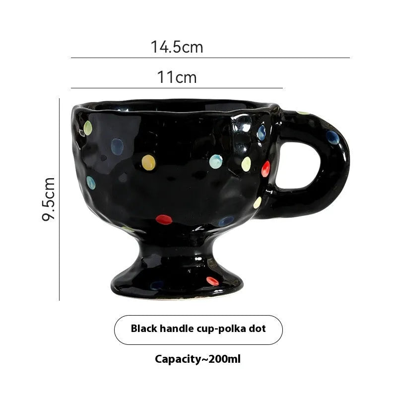 Hand-pinched irregular shaped ceramic mug in solid colour with modern simplicity design