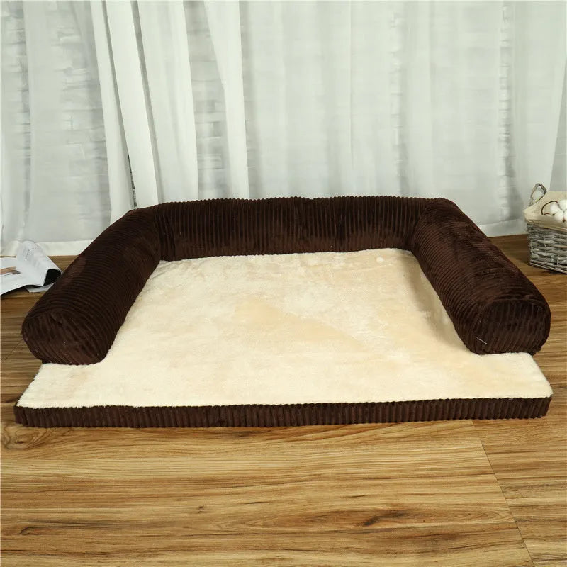 Corduroy bolster dog bed in grey, showing bilateral raised sides and non-slip base.