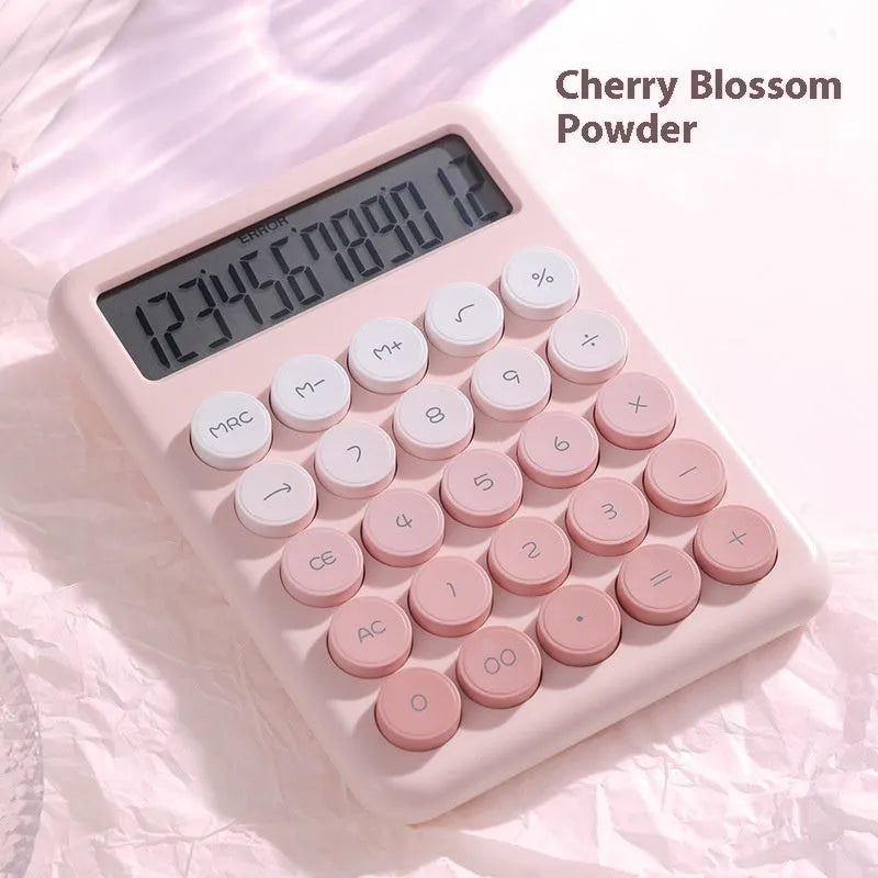 Gradient colour desk calculator showing violet, cherry blossom, blue and green shade options