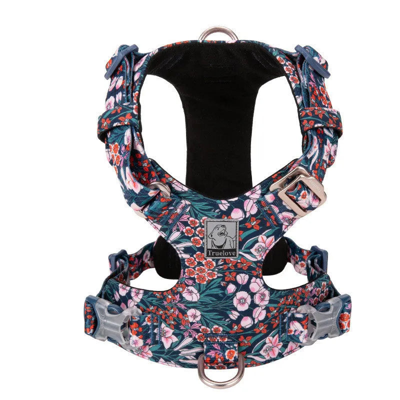 Cotton pet harness with chest strap in floral pattern, showing size adjustment points