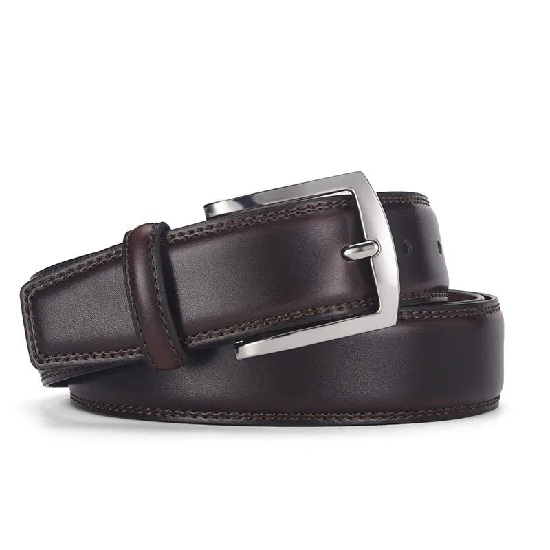 Men's black leather belt with silver alloy pin buckle showing two-layer cowhide construction