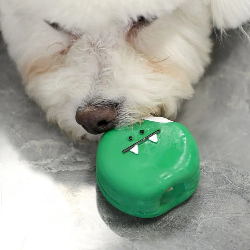 Yellow and green bread-shaped latex dog chew toy with squeaker.