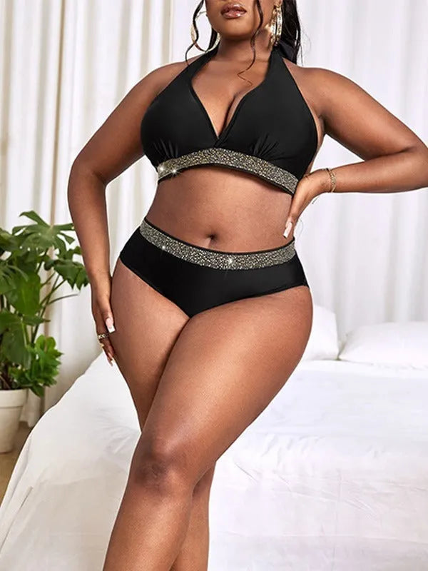 Black plus size women's bikini set with bra top and shorts on a mannequin.