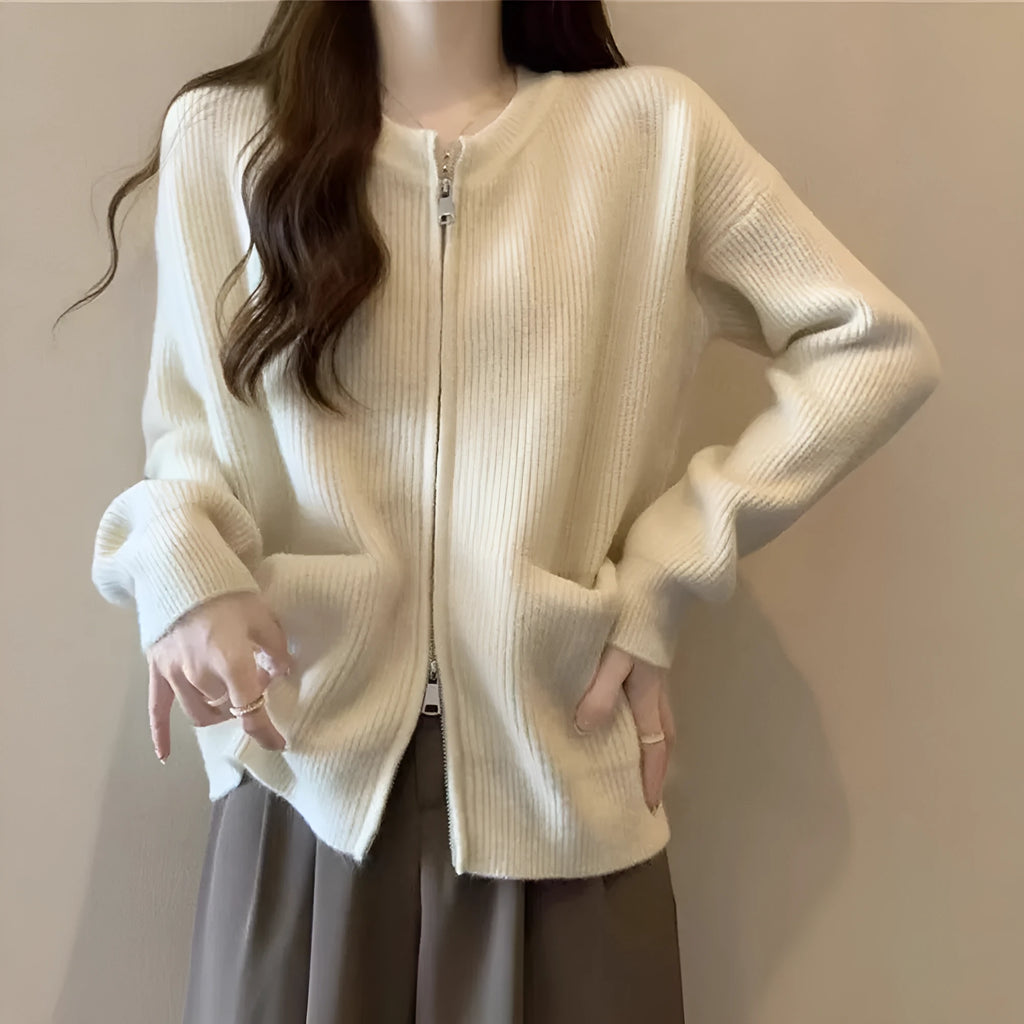 Beige viscose knit long sleeve cardigan sweater coat on a hanger
