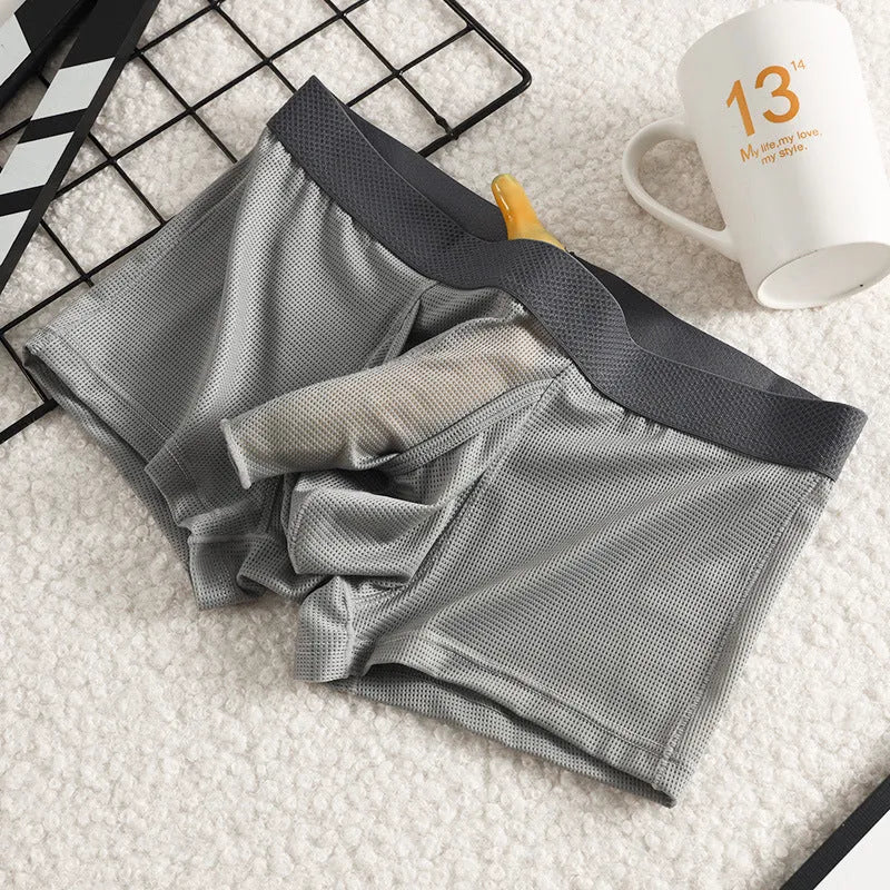Men's low waist ice silk boxer briefs in black, shown flat.