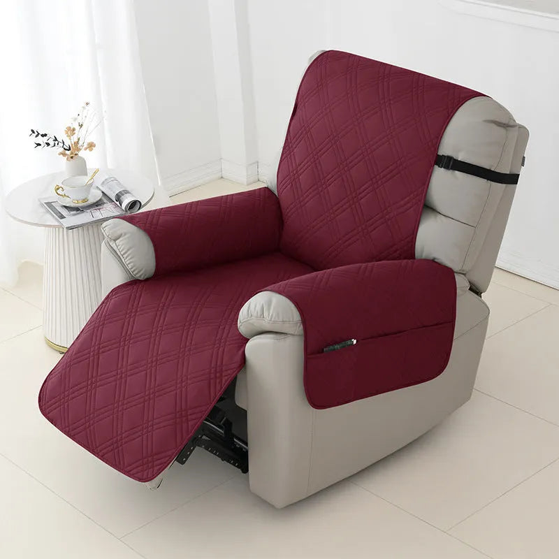 Quilted burgundy sofa cover on a Chivas massage chair