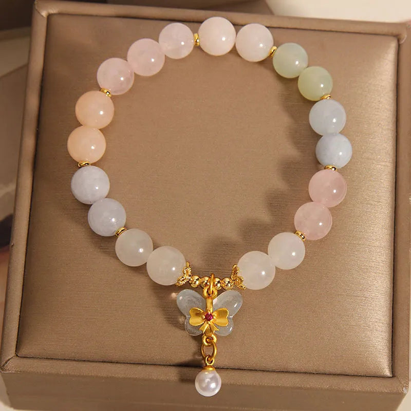 Crystal bracelet with natural Morganite butterfly pendant charm in candy colours on adjustable band