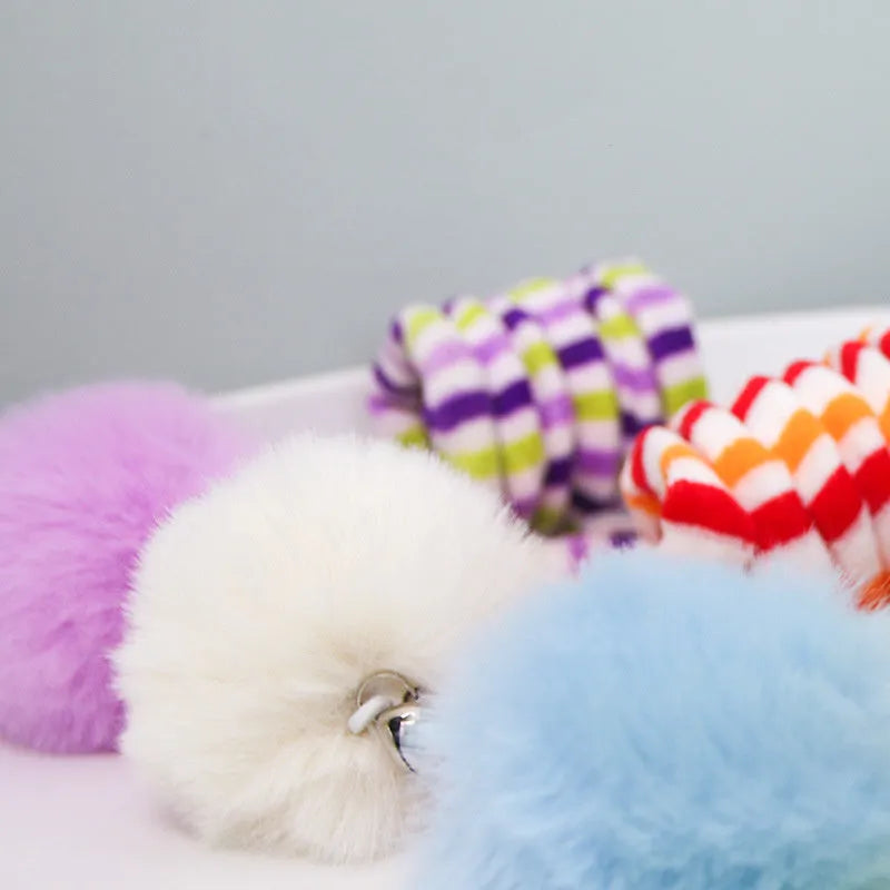 Spring-mounted inflatable ball cat toy with bell stick and suction cup attachment in various colours