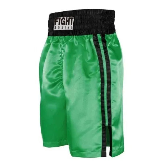Man wearing black and white striped elastic waist kickboxing shorts in a training stance.
