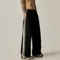 Men's black wide-leg climbing trousers with high waist and straight-leg design