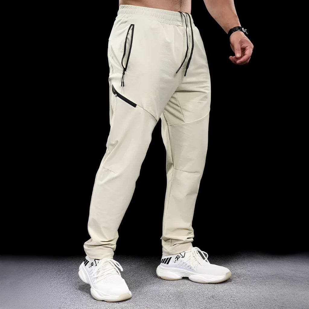 Men's waterproof quick-drying nylon workout trousers in army green for sports and running
