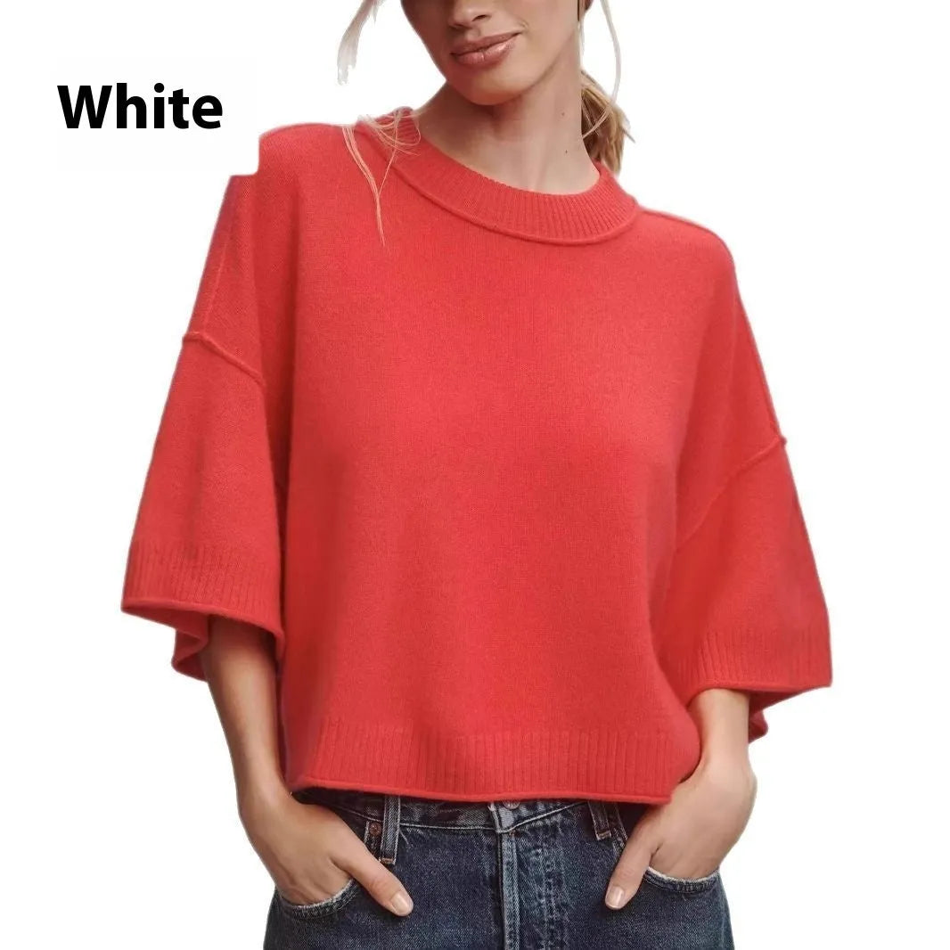 Red short sleeve viscose T-shirt with an exposed navel crop design on a model.