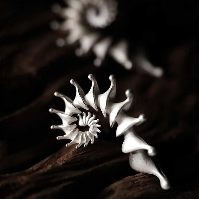 Matte finish conch shell ear studs with three-dimensional design and irregular edges