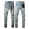 A pair of black slim fit skinny jeans with a straight leg and button fly closure on a mannequin.