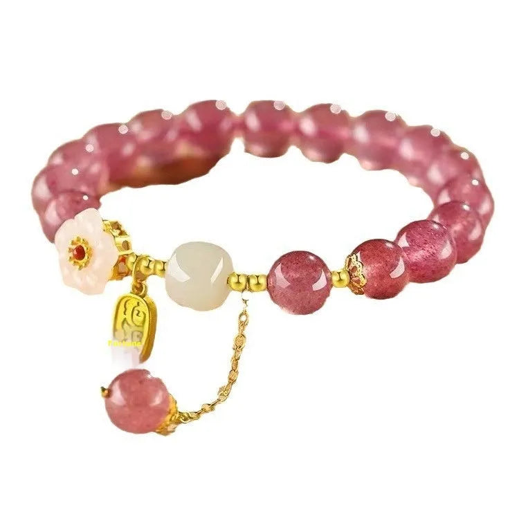 Handmade strawberry quartz crystal bracelet with hetian jade peach blossom elements in five style variations