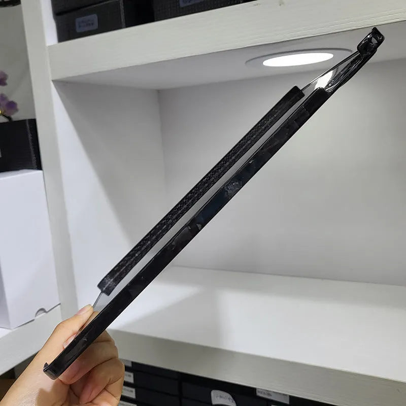 Carbon fibre hard protective cover for Apple iPad Pro 11 showing textured plaid pattern.