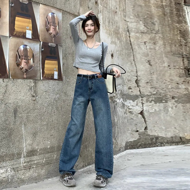 Women's high-waisted straight leg jeans in retro blue denim, shown in cropped and full-length styles.