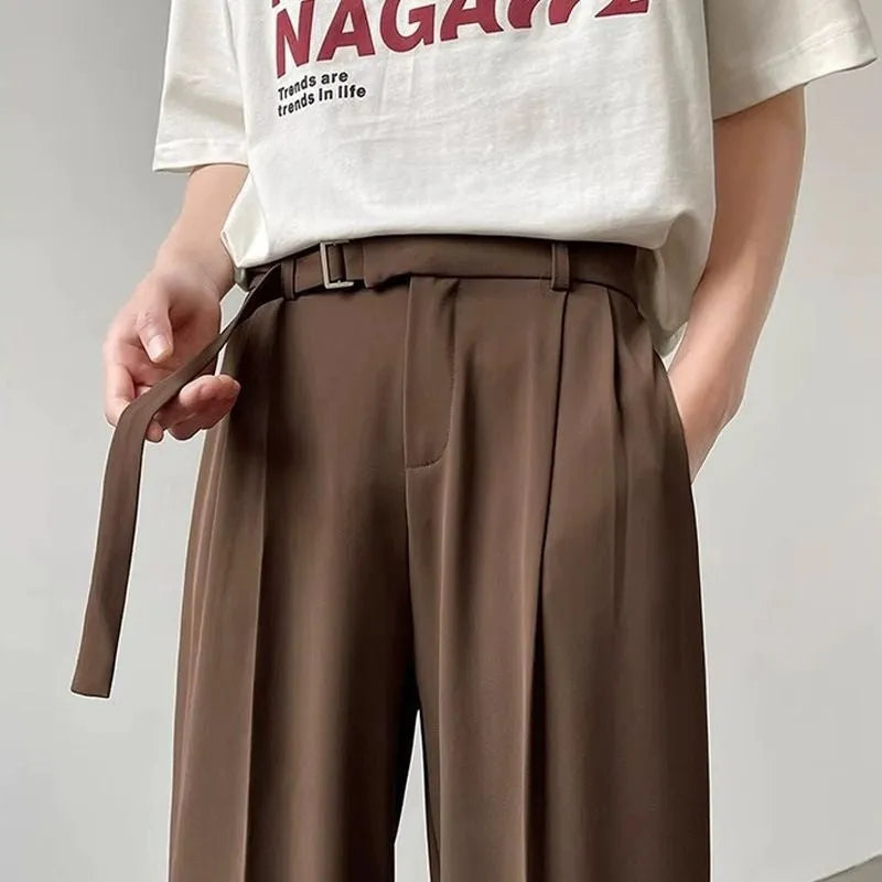 Thin straight wide leg trousers in black chemical fibre blend fabric with non-ironing feature