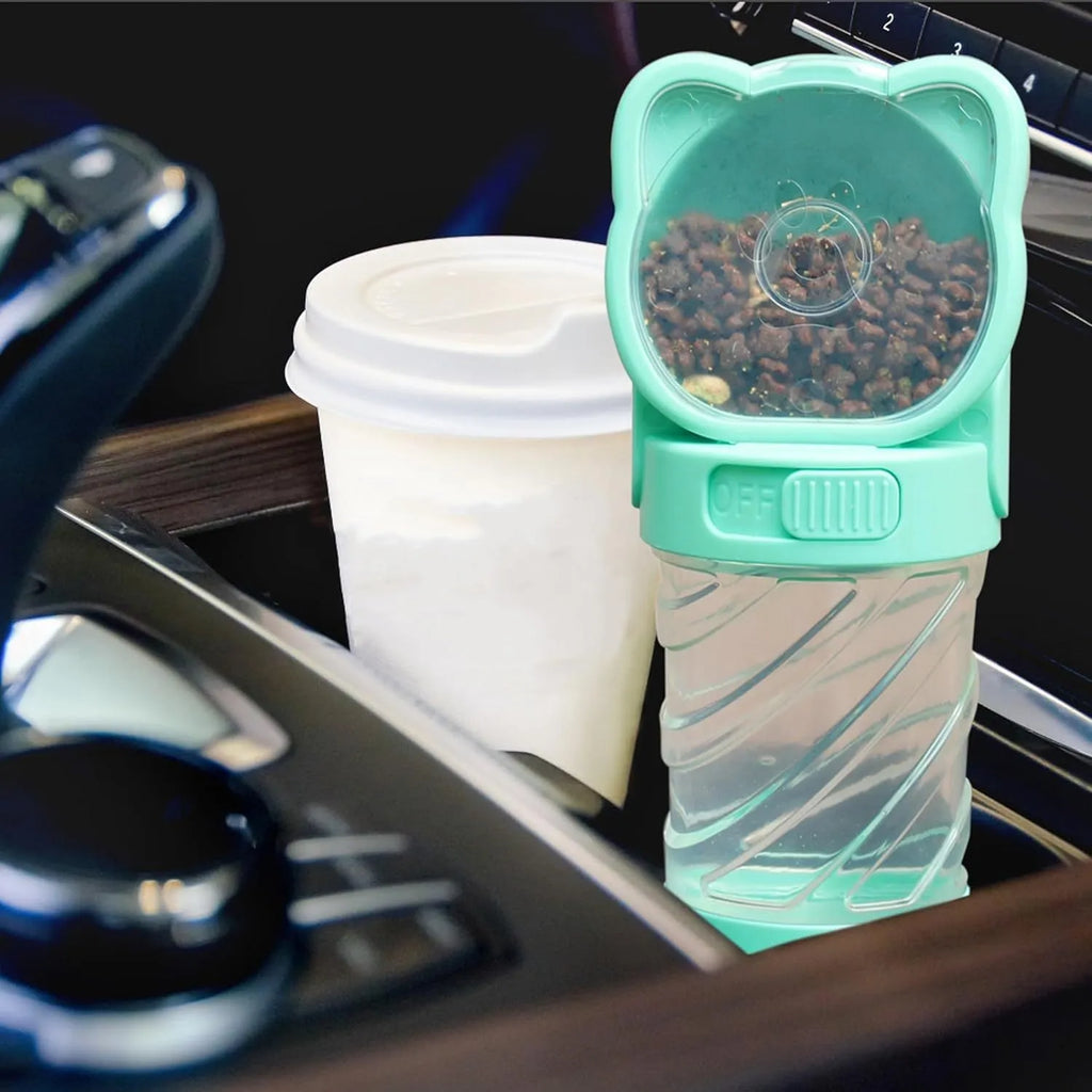Green 3-in-1 portable pet water bottle with food container and waste bag dispenser showing rotary switch