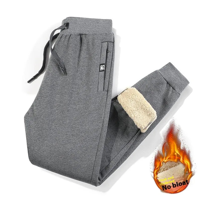 Men's black and grey fleece-lined cotton track pants with mid waist design